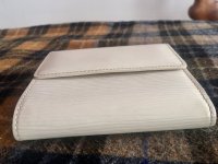 Real or fake? I believe this is a “louis vuitton epi zippy wallet”. I don't  see a date code though. : r/Louisvuitton