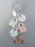 azturnandburn fake coach multi handbag keychain.jpeg