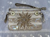 AudreySunMotifZipTopWristlet_47621_002.jpg
