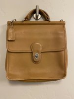 4newcomer fake coach ROM-9927 front.jpeg