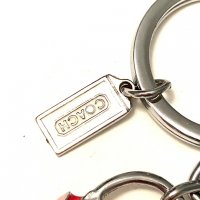 27ogle poshmark fake 3d handbag fob 1743 copied hangtag.jpeg