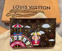 A Look at Louis Vuitton's New Christmas Animation Print for 2016 - PurseBlog