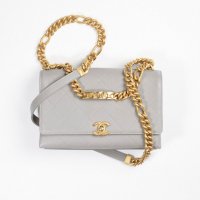 Chanel-Gray-Grained-Calfskin-Gold-Tone-Metal-Flap-Bag.jpg