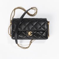 Chanel-Black-Lambskin-Flap-Bag.jpg