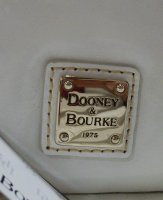 dooney patent wristlet.jpeg