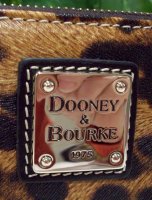 dooney zip around wallet leopard.jpeg