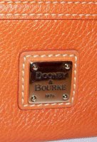 dooney dillen zip around wallet.jpeg