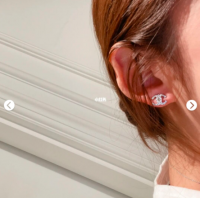 21K small CC earrings in the ear.png