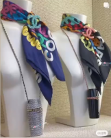 21K long necklace broaches scarves.png