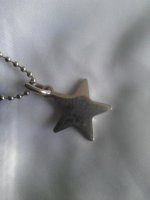 Coach red star charm ll.jpg