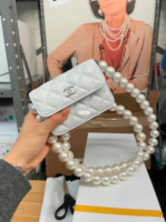 SAphoto; smaller wallet on pearl chan.png