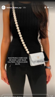 mini WOC on long pearl chain.png