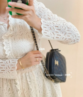 adjustable caviar camera bag.png