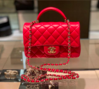 dark pink top handle flap bag.png
