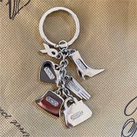dk_japan fake coach BCA keychain back.jpeg