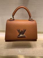 Eluxury Company - Introducing the Twist One Handle PM handbag in