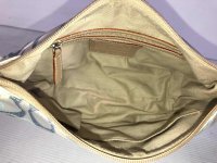  goodwill_industries_of_san_francisco fake coach entrupy M2K-6332 open.jpeg