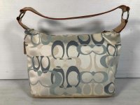  goodwill_industries_of_san_francisco fake coach entrupy M2K-6332 back.jpeg