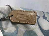  goodwill_industries_of_san_francisco fake coach entrupy M2K-6332 hangtag.jpeg