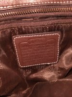 autoremoval fake coach wristlet - threatens legal action if removed creed_lining.jpeg