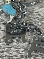 shophappyhuntingla fake coach keychain back.jpeg