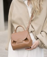 The Polene Neuf bag in Chalk (right) and Taupe (left) color are both  stunning options that exude elegance and style. While they share some…