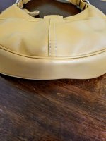 Coach tan buckle bag bottom.jpg
