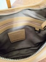 Coach tan buckle bag inside.jpg