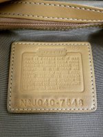 Coach tan buckle bag creed.jpg