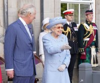 59719199-10969771-The_Prince_of_Wales_known_as_the_Duke_of_Rothesay_when_in_Scotla-m-75_165660...jpg