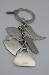 antiquefindings fake? keychain boot umbrella glove purse hat back.jpeg