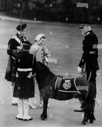 1953-06-24 Holyroodhouse with Cruachan II trying to eat her bouquet 001.jpg