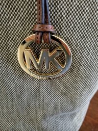 Michael Kors front Medallion.jpg