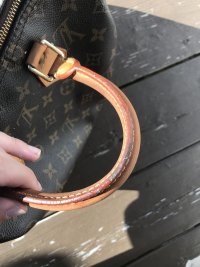 What product do you use to fix sticky glazing on LV speedy handles? See pic
