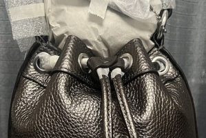 coach leather dempsey foam on drawstring.png
