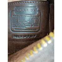 naami-na-7szklm fake coach X9707 creed.jpeg