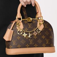 louis-vuitton-fleur-de-monogram-bag-charm-chain-s00-key-holders-and-bag-charms--M65111_PM1_Wo...jpeg