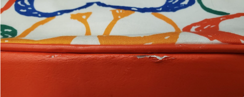 shopmariongoodwill fake coach 1855 peeling plastic trim.png