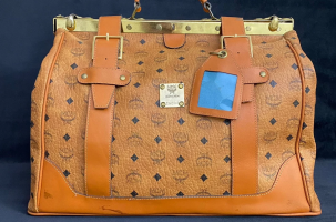 Screenshot 2023-10-20 at 17-52-41 Vintage MCM Leather Travel Bag Brass Lock Detail Flawless - ...png