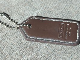 Sodapop Surprise - letsbeniftythrifty fake coach hangtag back.jpeg
