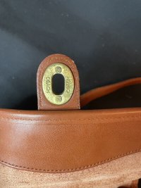 kavi_1641 fake coach turnlock back.jpeg