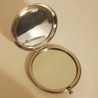 jamelangle-44 fake coach purse mirror 2.jpeg