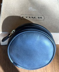 coach round leather belt bag front.jpeg