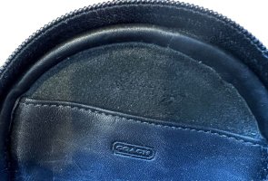 coach round leather belt bag open inside pocket.jpeg