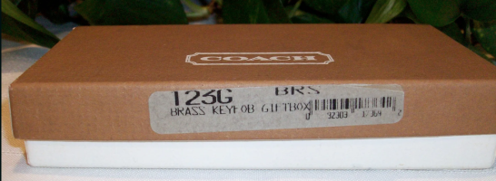 coach 123 123g brass lozenge hangtag kf.png