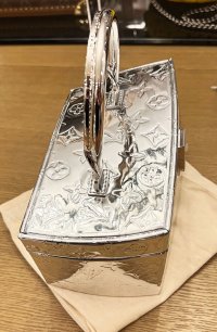 LV-Frank-Gehry-Twisted-Box-Silver-Side-View.jpg