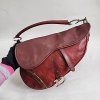 dior_saddle_leather_vintage_1709438102_4a63ecbe_progressive.jpg