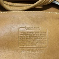 little tan bag creed.webp