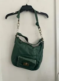 green bag knotted handle before.webp