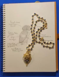 TSC small owl locket.webp